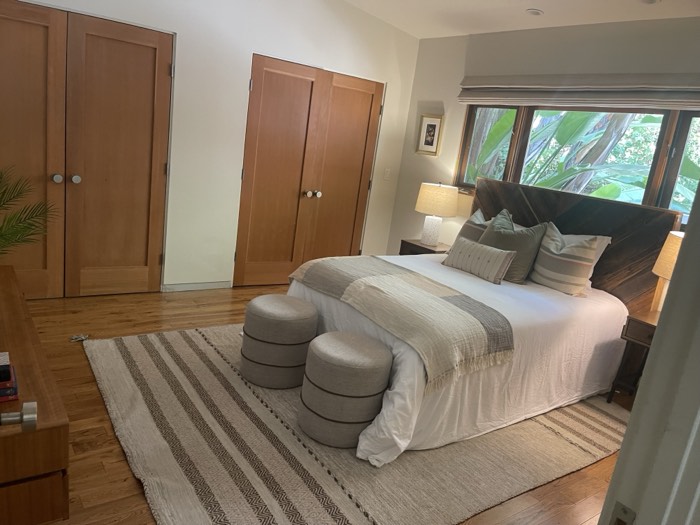Cozy bedroom with tropical garden view